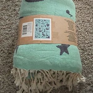 limited edition Centennial Disney100 towel Disney and Pixar Characters design.